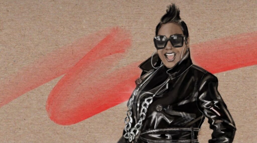 A Woman Wearing A Black Jacket And Sunglasses